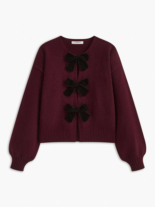Sweter z dzianiny z ozdobną kokardką