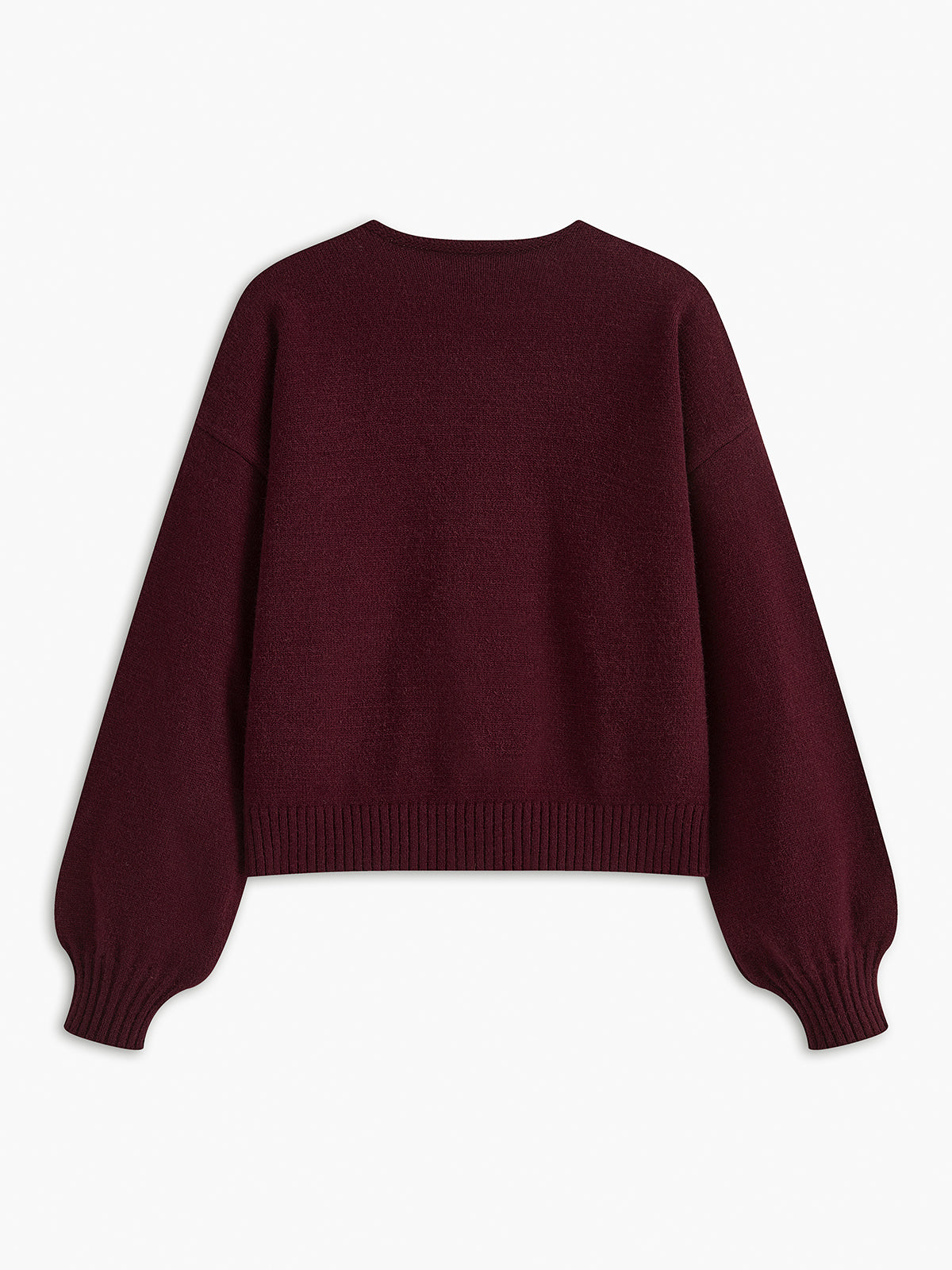 Sweter z dzianiny z ozdobną kokardką