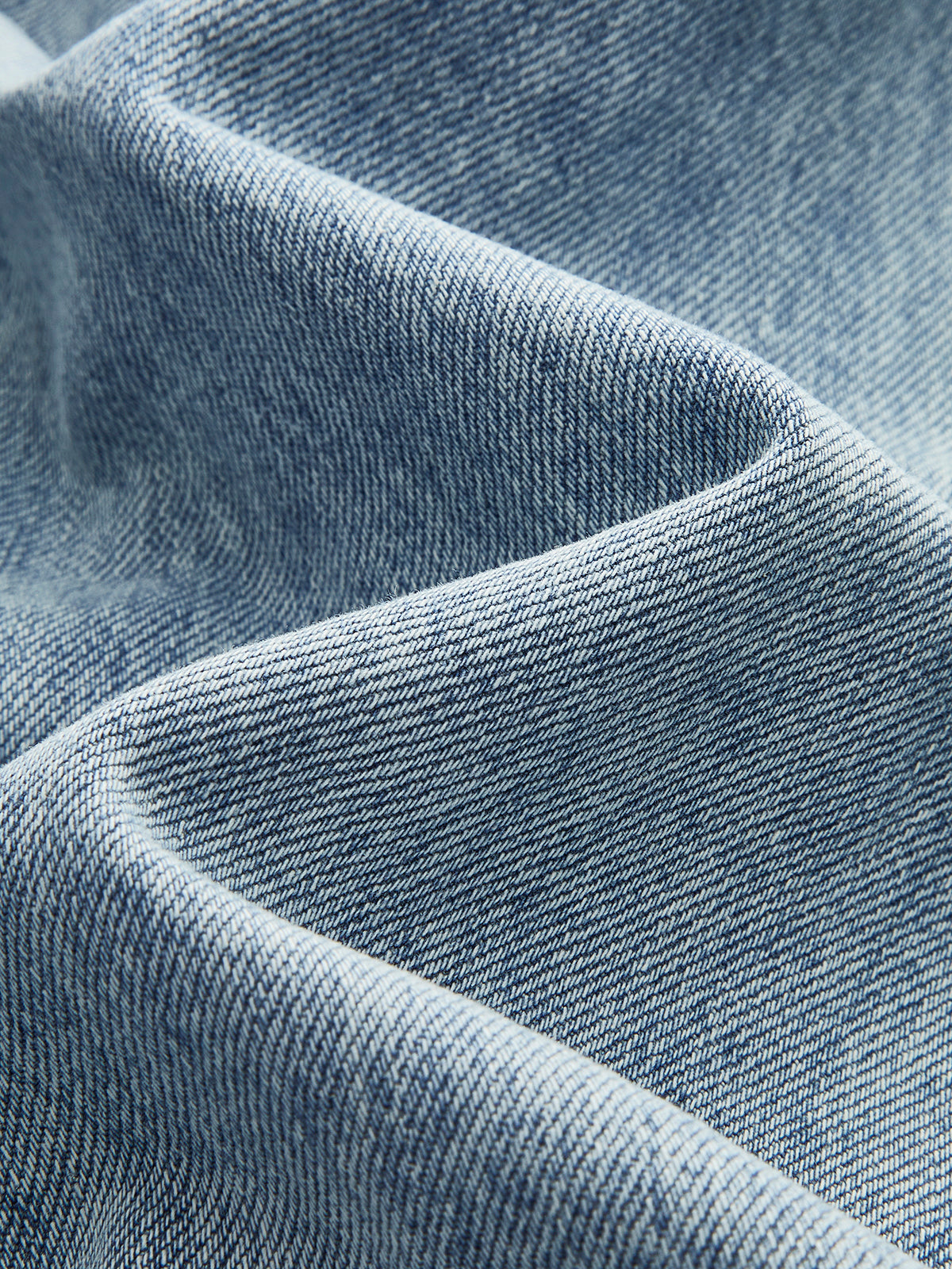 Asymetryczne dżinsy z szerokimi nogawkami