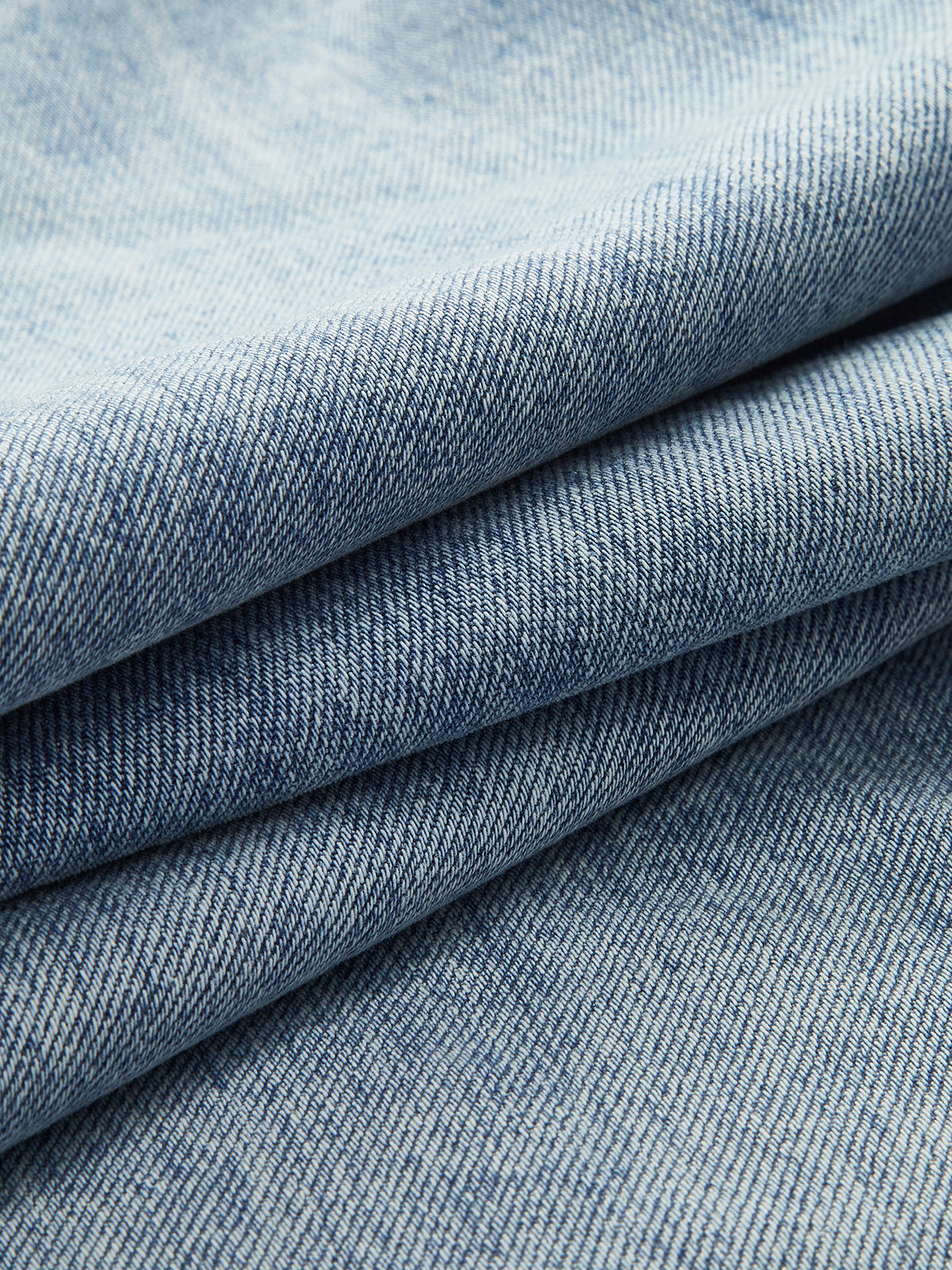 Asymetryczne dżinsy z szerokimi nogawkami